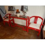 A contemporary Chinese red lacquered altar table, the rectangular top with a clear glazed panel