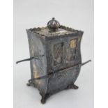 A late 19th century German silver box and cover modelled as a sedan chair, with pierced crown finial