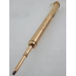 A 14ct yellow gold telescopic propelling pencil, 18g.