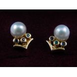 A pair of 18 carat yellow gold and pearl ear studs, each set a pearl above a small sapphire, ruby,