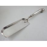 A late Victorian silver crumb scoop with embossed pistol grip handle, Harrison Brothers,