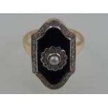 A pearl and diamond dress ring,