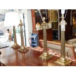 A set of four Victorian style brass Ionic column lamp bases. H.