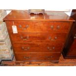A 1920s mahogany four drawer chest, raised on ogee bracket feet. W. 54cm