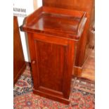 A Victorian mahogany bedside cabinet, with three-quarter gallery. H. 43cm