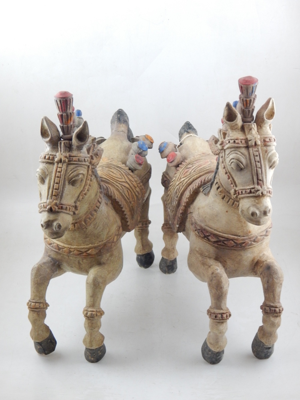 A pair of mid 20th century Sri Lankan carved wood Hindu temple horses, with polychrome painted manes - Image 2 of 3