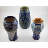 Three early 20th century Royal Doulton pottery vases, decorated with floral and geometric