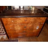 A 19th century walnut and ebonised Biedermeier style secretaire chest, the rectangular moulded top