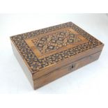 A Victorian Tunbridge ware rectangular rosewood box, the cover with geometric decoration. W.