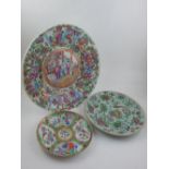 Three 19th century Chinese Canton porcelain items, to include a famille rose charger, D. 34cm, a