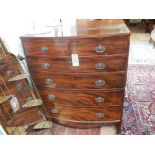 A Victorian mahogany bowfront chest of drawers, in two parts, with an arrangement of two short and