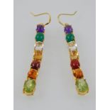 A pair of 14ct yellow gold multi gemstone line earrings