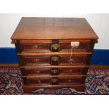 A small 17th century design oak chest, fitted four geometric moulded drawers on bracket feet,