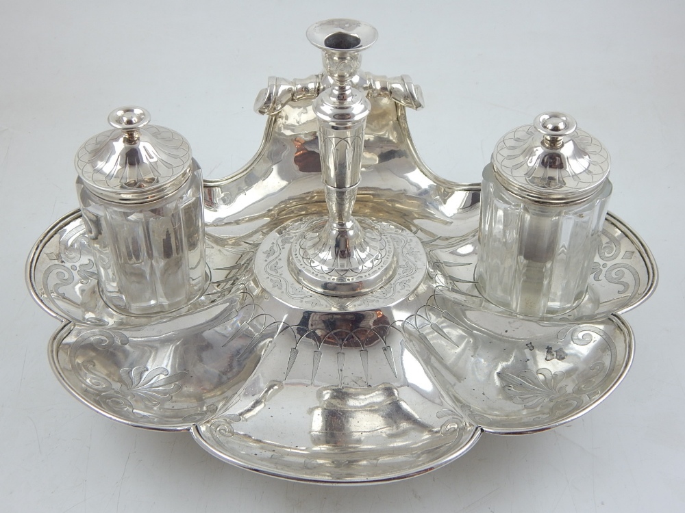 A Victorian silver scallop shell standish, the anthemion engraved stand housing a central taper
