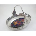 An early 20th century Liberty pewter oval basket with central loop handle,