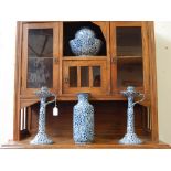 A pair of early 20th century Wood and Sons Chung Ware blue and white pottery chambersticks of