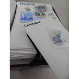 Three box files containing World stamps and covers, sorted by country in alphabetical order,