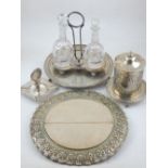 A late Victorian silver plated salver, a two bottle condiment set, bread board and sundry