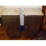 A pair of early 20th century continental pedestal cabinets, grey painted steel with white marble