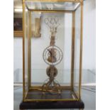 A Victorian style brass fusee skeleton clock, the circular white chapter ring with Roman numerals,