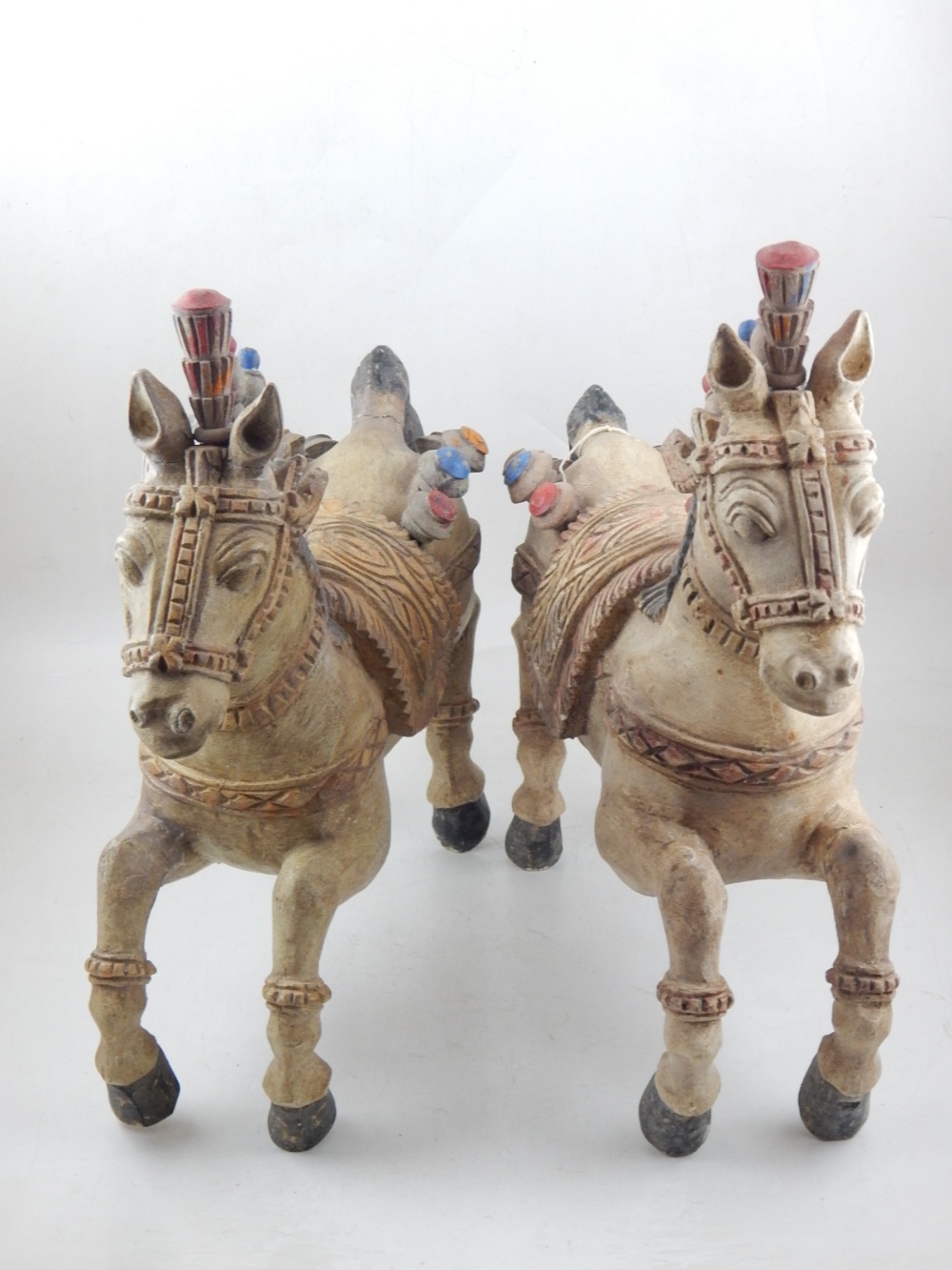 A pair of mid 20th century Sri Lankan carved wood Hindu temple horses, with polychrome painted manes - Image 3 of 3