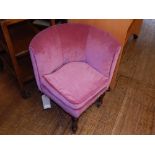 A Victorian corner chair, upholstered in pale red draylon, raised on turned feet. H.70cm, D.