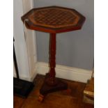 A mid 19th century marquetry occasional table, the octagonal top on a ring turned support,