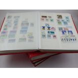 Four red stockbooks containing Russia, Spain, Italy stamp collections, mint and used,
