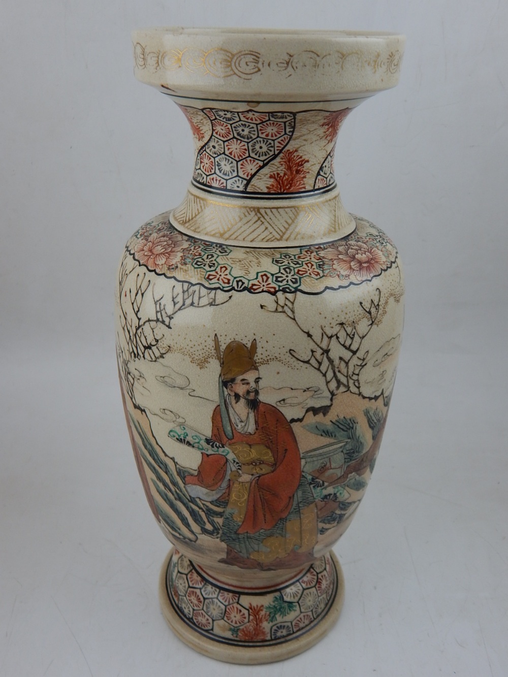 A late 19th century Satsuma vase, of baluster form and decorated with images of scholars. H.