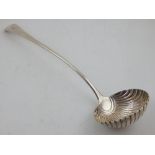 A George III silver punch ladle with shell bowl, London 1802, by Thomas Dicks. L.