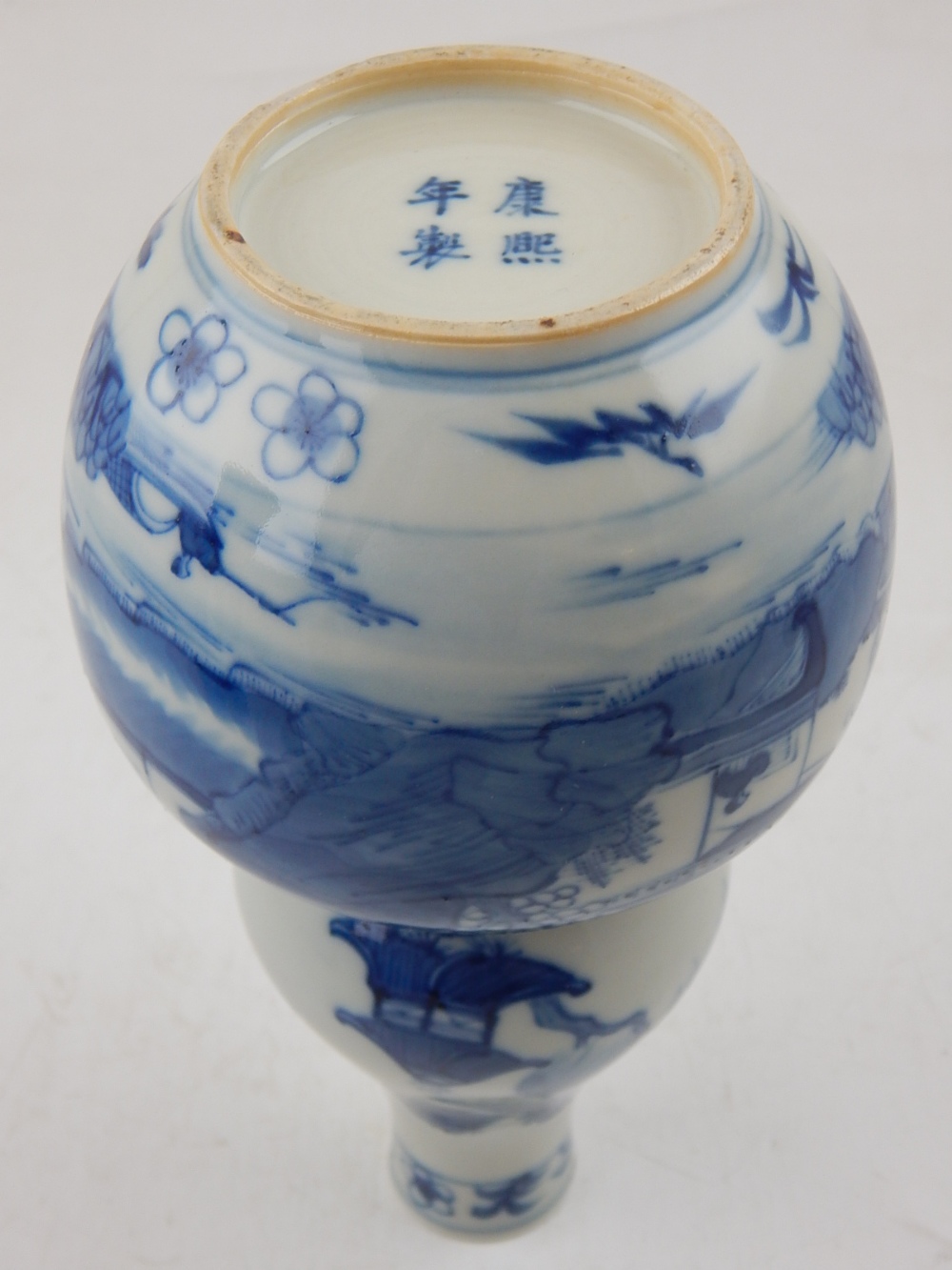 A Chinese blue and white double gourd vase, decorated with a village in a mountainous landscape, - Image 2 of 2