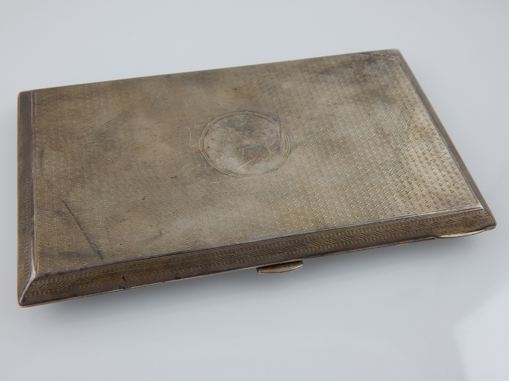 A silver cigarette case, Birmingham 1946,