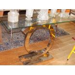A contemporary glass and chrome console table,