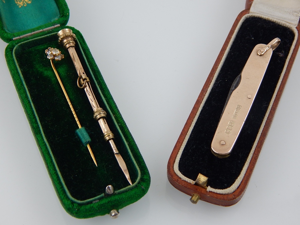 A 9 carat yellow gold pocket knife, together with a 9 carat yellow gold toothpick,