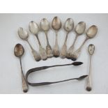 Eight various Georgian silver tea spoons, together with a mustard spoon and a pair of sugar tongs,