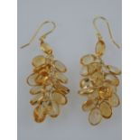 A pair of 14ct yellow gold citrine multi cluster earrings.