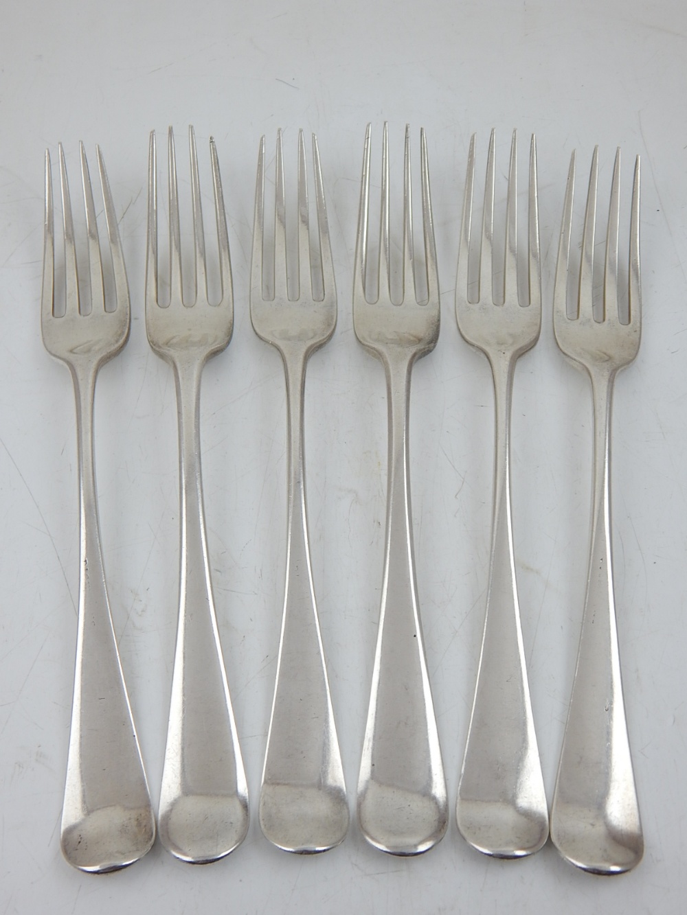 A set of six George III silver table forks, George Smith & William Fearn, London 1789-90.