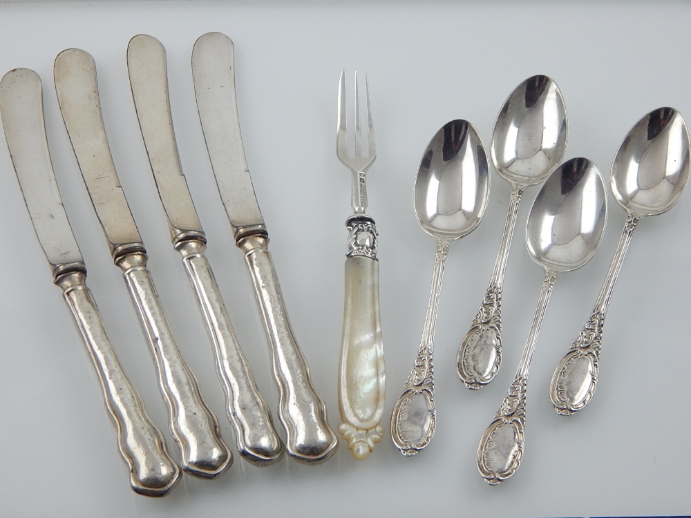 Four Edwardian silver teaspoons,