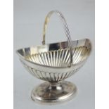 A George III silver swing handled basket, Peter Podie, London 1795, 260g.