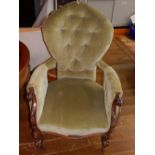 A Victorian mahogany and upholstered button back chair,