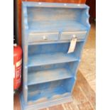 A Victorian style blue painted pine hanging wall bracket with four graduated tiers and two drawers.