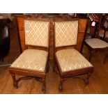 A pair of late 19th century carved walnut side chairs,