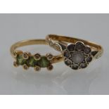 A 9 carat yellow gold and three stone apatite ring, each corner mounted with small diamonds,