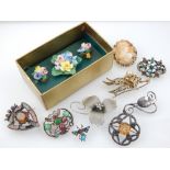 A quantity of brooches, to include a yellow metal and cameo set brooch, a silver and citrine brooch,