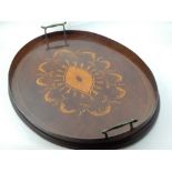 An Edwardian oval inlaid tray, incorporating swags and a fan motif, with a gallery and twin brass