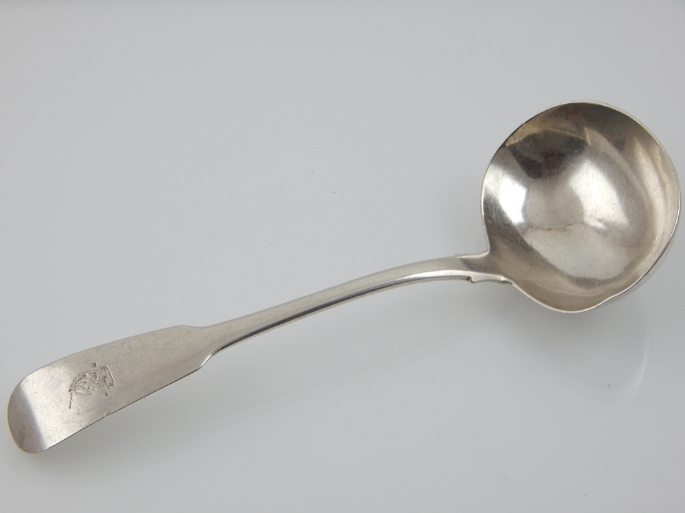 An Irish Georgian silver sauce ladle, Dublin 1812 by Samuel Neville and William Law, engraved