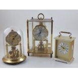 A late 20th century carriage timepiece, together with two other clocks, (3)