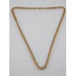 A 9 carat yellow gold flat curb link necklace, stamped 375 to clasp, 20g.