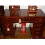 George III style mahogany pedestal desk, with leather inset top over eight drawers. W. 124cm