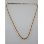 An 14 carat yellow gold rope twist necklace, stamped 14k to clasp, 16g.